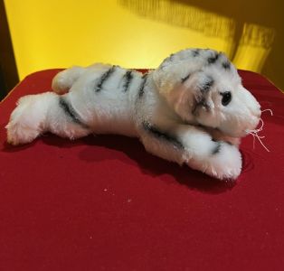 peluche tigre blanc